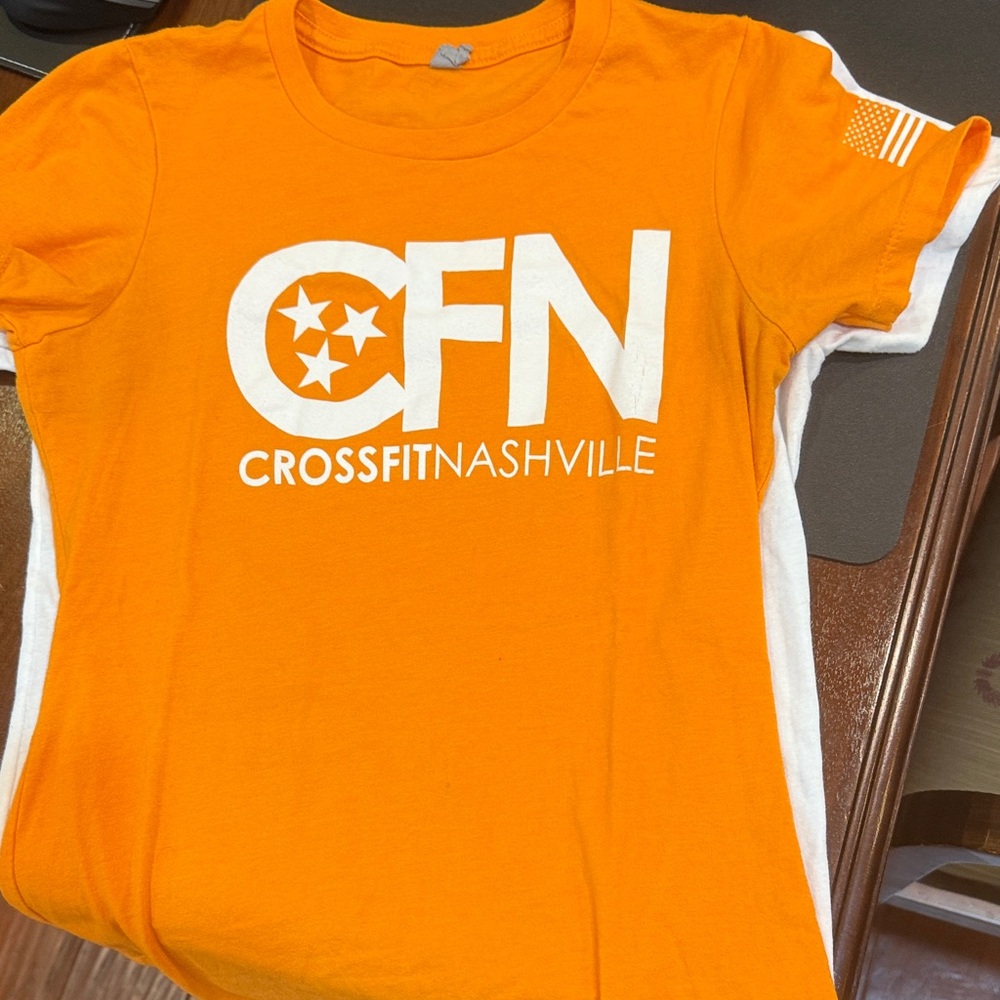 Black White and Orange Tee’s. This is a bundle of 6 tees. All brand new.